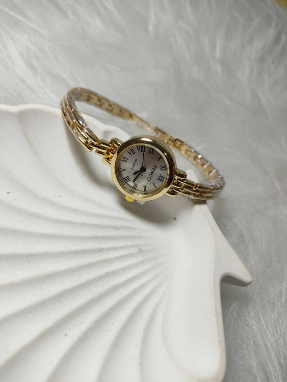 ساعت مچی بند فلزی صفحه رومی صفحه سفید